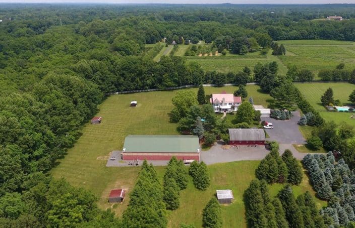 Showcase Auction: Stately Custom Home with Barn and Riding Arena